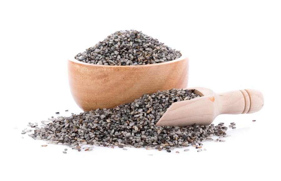 Black sesame scrub seed bowl isolated white surface 29402